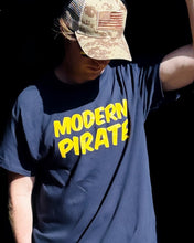 Load image into Gallery viewer, The Sea Serpent Blue Modern Pirate Original Tee is the tshirt for your modern pirate needs. modern pirate is your go to brand for artist needs and this sea serpent modern pirate tee will make your modern pirate life filled with booty! Modern pirate sea serpent blue original tee pose