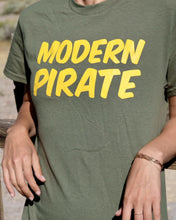 Load image into Gallery viewer, This modern pirate gator green original tee is the modern pirate tee for your modern pirate needs. Modern pirate is the brand for any and all artist needs. This modern pirate tee will improve your modern pirate life with more booty for your modern pirate ship. This is the modern pirate gator green tee close up photo.