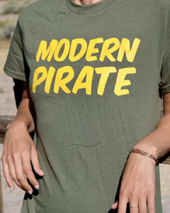 This modern pirate gator green original tee is the modern pirate tee for your modern pirate needs. Modern pirate is the brand for any and all artist needs. This modern pirate tee will improve your modern pirate life with more booty for your modern pirate ship. This is the modern pirate gator green tee close up photo.